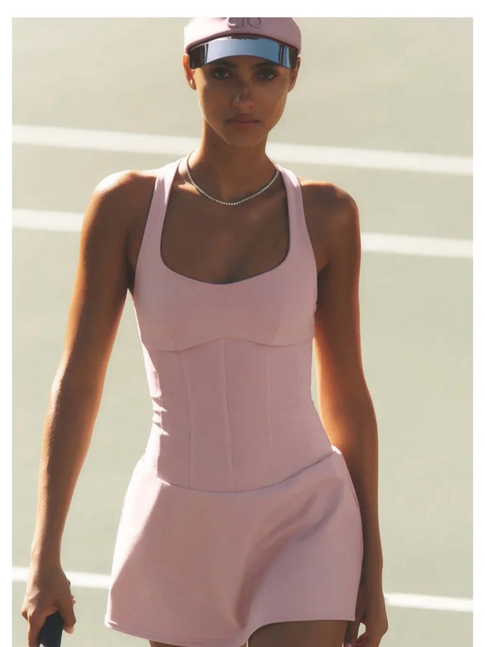 ALO Yoga Airbrush Sparks Fly Corset Tennis Dress in dusty pink